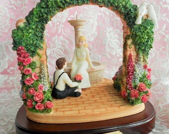 GLYNDA TURLEY FIGURINE Dated 1992 Courtyard Boy Girl Sweetheart Lover Fountain Pink Rose Garden Arch Lavender Floral Flower Artist Signature