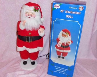 CHRISTMAS SANTA CLAUS Jolly Old St Nick Motion Animated Mechanical Plush Figurine Plug In 24 inch 2 Feet Tall Unused Mint Box Moving Doll