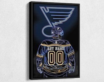 May include: A neon blue and yellow St. Louis Blues hockey player illustration with the text "ANY NAME 00" on the jersey.