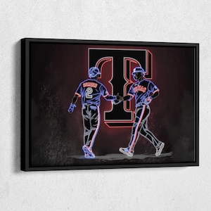 May include: Two baseball players in blue and red uniforms stand in front of a neon sign of the letter "T" with the word "Texas" on it. The players are facing each other and appear to be high-fiving. The background is a dark red with a grainy texture.