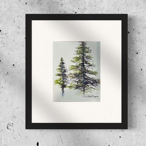 This is a picture of two alpine pine trees painted in two colors "Moonglow" and "Serpintine". They are painted in an abstract calligraphy style in watercolor paints on cold pressed watercolor paper.