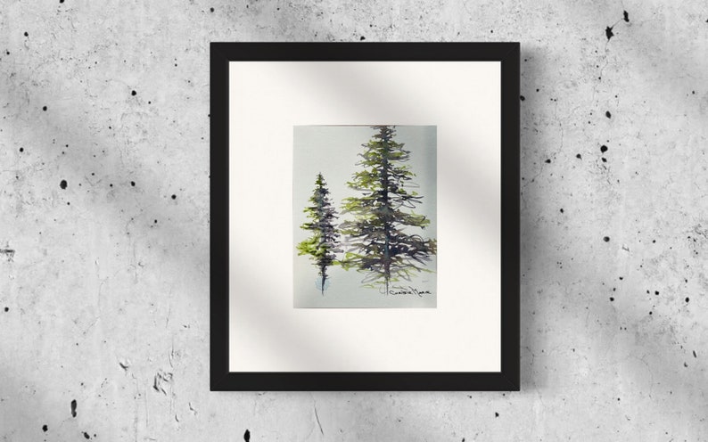 This is a picture of two alpine pine trees painted in two colors "Moonglow" and "Serpintine". They are painted in an abstract calligraphy style in watercolor paints on cold pressed watercolor paper.