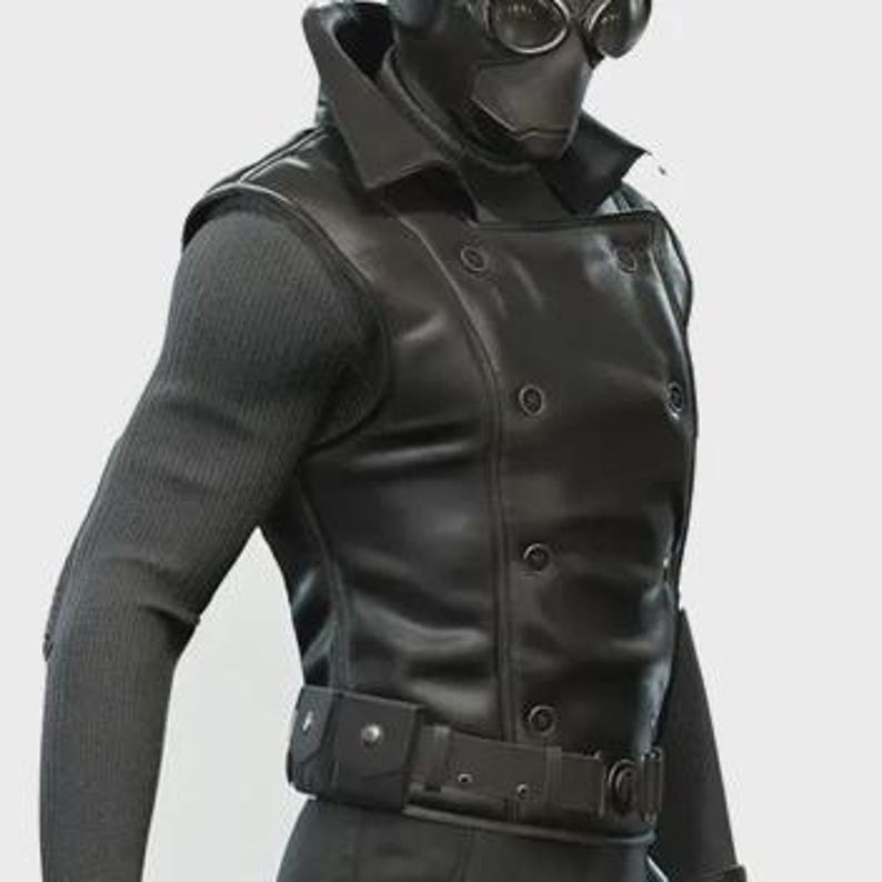 May include: A black leather vest with a double-breasted design and a matching belt. The vest has a high collar and is worn over a long-sleeved, ribbed black shirt. The outfit includes a black mask with goggles.
