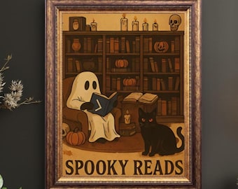 May include: A framed Halloween-themed print featuring a ghost reading a book in a cozy chair, a black cat, and the text "Spooky Reads." The background includes a bookshelf, pumpkins, candles, and a skull.