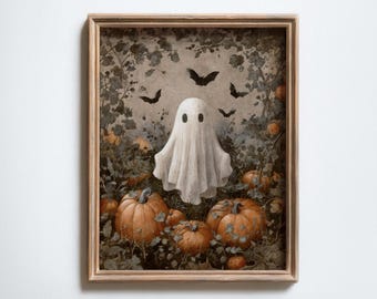 Puede incluir: Una impresión enmarcada con temática de Halloween que presenta un fantasma blanco con ojos negros, rodeado de calabazas naranjas, follaje verde y murciélagos negros. La obra de arte tiene una paleta de colores vintage y ligeramente apagados.