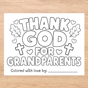 May include: A black and white coloring page featuring the text THANK GOD FOR GRANDPARENTS in bold bubble letters. The design includes illustrations of two oak leaves, four small hearts, and two crosses, with a line for a name after Colored with love by: