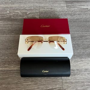 カルティエ ビッグCフレーム ブラウンレンズ リムレスサングラス