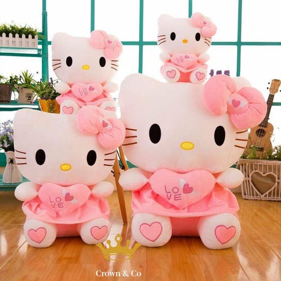 Delightful Pink Hello Kitty Plush Toy: Soft Cuddly Gift (25cm/30cm