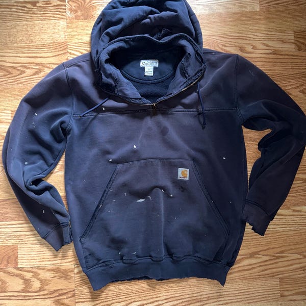 Sudadera vintage con cremallera de un cuarto y capucha desgastada