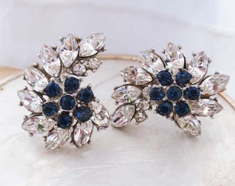 Trifari Rhinestone earrings with blue center