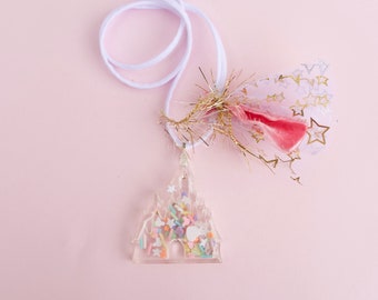 Princess castle resin shaker necklace.
