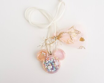 Minnie Mouse resin charm shaker necklace.