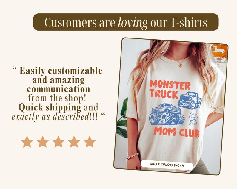 May include: Ivory-colored t-shirt with a Monster Truck Mom Club graphic in red and blue. The shirt features the text "Monster Truck" above two truck illustrations and "Mom Club" below. The shirt color is ivory.