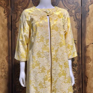 May include: A rustic wooden sign with the text "Welcome" in white lettering. The sign features a distressed finish and a simple, inviting design, perfect for a front porch or entryway.