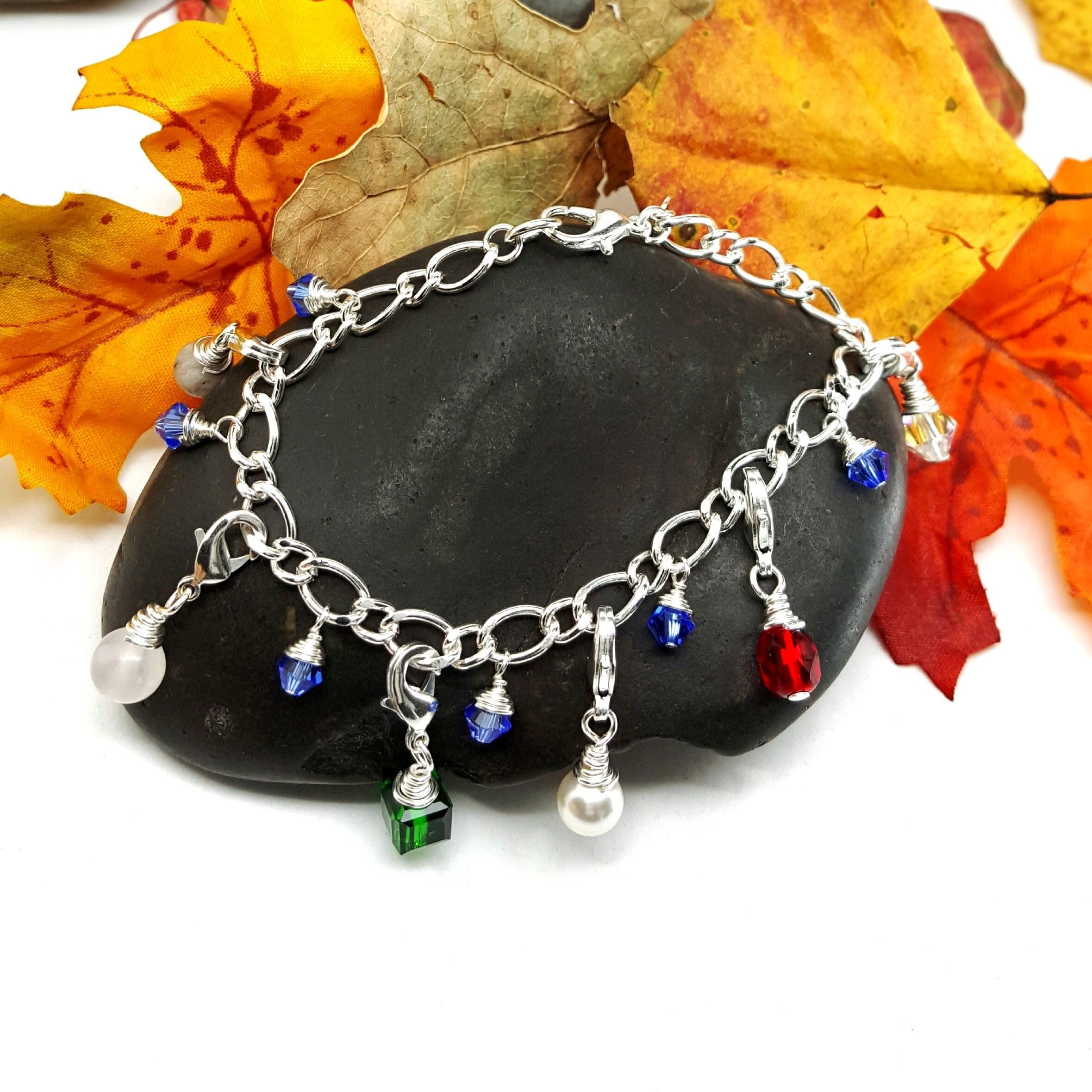Silver Plated Purity Charm Bracelet With Detachablecharms