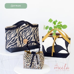 May include: Three tote bags with animal print designs. The largest bag has a zebra pattern, the middle bag has a leopard print, and the smallest bag has a black and white pattern. All bags have black bases and handles.