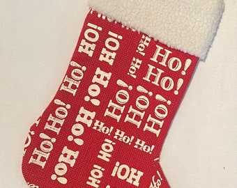 Red Burlap with Ho! ho! And a White Sherpa Cuff