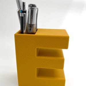 Pots de bureau pour stylos et crayons, pinceaux, pinceaux de maquillage ou fleurs. Des contenants décoratifs pour tout ou rien !