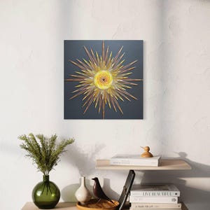 May include: An abstract artwork with a sunburst design. The artwork features a central yellow spiral surrounded by radiating brown and gold elements against a dark grey background. The artwork is mounted on a white wall, with decorative shelves below.