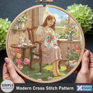 Woman Cross Stitching in Blooming Spring Cottage Cross Stitch Pattern, Modern Girl Cross Stitch Pattern, Counted Cross Stitch Sampler