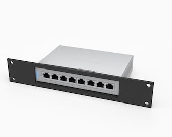 May include: A black 1U rack mount bracket designed for a UniFi Switch 8, featuring a rectangular cutout for the switch ports and mounting holes on each side. The switch is silver with eight numbered Ethernet ports and a blue status light.