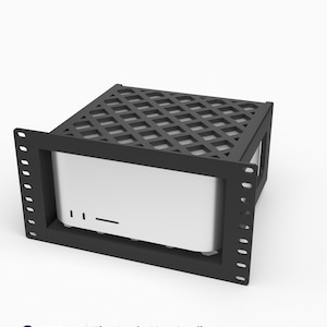 May include: A black 3D-printed rack mount for an Apple Mac Studio computer. The mount features a lattice-patterned top and a front panel with mounting holes. Text at the bottom reads: 3D Rack Mounts Fits Apple Mac Studio 10" 3U PETG Made in USA.