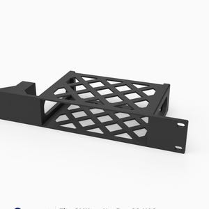 May include: A black 1U rack mount for a GMKtec NucBox G9 NAS. The mount features a lattice-style diamond pattern on the top surface and includes a flat front panel with two mounting holes on each side. The text 3D Rack Mounts Fits GMKtec NucBox G9 NAS 19" 1U PETG Made in USA is visible.