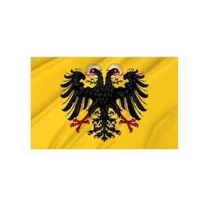 Könnte beinhalten: Eine gelbe Flagge mit einem schwarzen Doppeladler-Emblem. Der Adler hat rote Krallen und Schnäbel sowie einen Heiligenschein um jeden Kopf. Die Flagge hat eine gewellte Textur.
