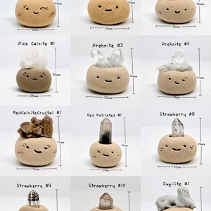 May include: A collection of small, tan ceramic pots, each with a smiling face and a different crystal formation. Measurements are provided in millimeters. The crystals vary in color, including clear, brown, and pink. The pots are labeled with crystal names and numbers.