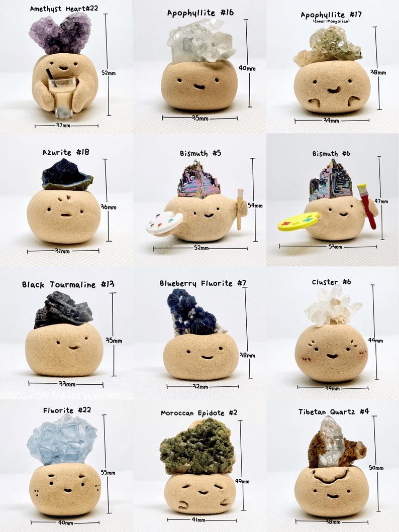 May include: A collection of whimsical ceramic figures, each topped with a different gemstone. The figures have smiling faces and are labeled with the gemstone type and a number. Measurements are in millimeters.