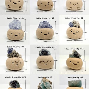 May include: A collection of small, tan ceramic pots, each with a unique gemstone on top. The gemstones vary in color, including blue, green, and purple. Each pot has a smiling face design and is labeled with a gemstone type and number.