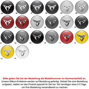 May include: A collection of 26 silicone emblem designs, each featuring a stylized emblem in various colors and textures, set against a circular background. The designs include metallic, carbon fiber, and solid color options.