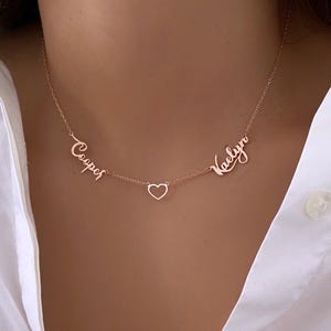 Anpassat halsband i massivt guld med dubbelt namn – 8K eller 14K guld med hjärtberlock