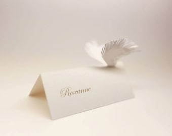 Bird wings on card | White wedding place cards | Flying name cards