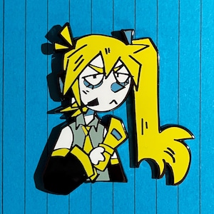 May include: A yellow and black enamel pin featuring a stylized anime character with yellow hair and a black outfit. The character has a tired expression and is holding a yellow object. The pin is set against a blue background.