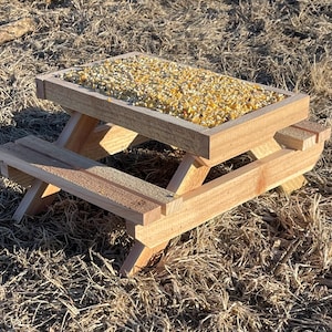 Chicken feeder picnic table