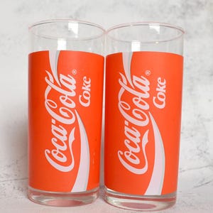 Vintage Coca-Cola Glasses (Set of 2) – Classic Red Wrap Design – 1970s Retro Drinkware – Collectible Coke Glasses – Soda Memorabilia Kitchen