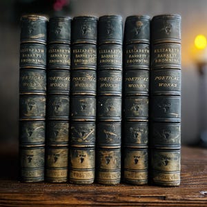 May include: A stack of six antique books with dark green covers. The spines display the title "Elizabeth Barrett Browning, Poetical Works" in gold lettering. The volumes are labeled I through VI.
