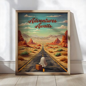 May include: A retro-style poster with the text "Adventures Awaits" in a stylized font. The poster features a desert landscape with a long, straight road leading into the distance. A ghost figure with a suitcase walks down the road.