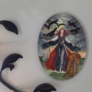 The Morrigan Oval Tile Wall Hanging by Mickie Mueller