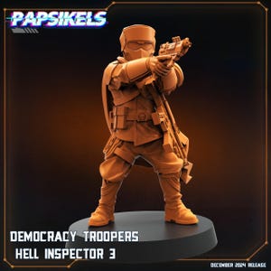 May include: A 3D printed miniature of a futuristic soldier wearing a helmet and holding a gun. The miniature is painted in a brown color and is standing on a base. The text "DEMOCRACY TROOPERS HELL INSPECTOR 3" is printed below the miniature.