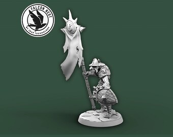 May include: A detailed, grayscale miniature figure of a fantasy warrior holding a banner. The figure is on a round base, with a shield and armor. The banner has a torn design. The Falcon Nest logo is in the upper left.
