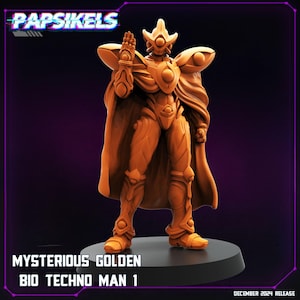 May include: A golden-colored, humanoid robot figure with a cape and a large head with a single eye. The figure is standing on a round base. The text "MYSTERIOUS GOLDEN BIO TECHNO MAN 1" is printed below the figure.