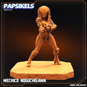 May include: A tan-colored figurine of a female Predator character, holding a gun and standing on a textured base. The figurine has detailed armor and dreadlocks. The text "Papsikels" and "MECHICO NOGUCHISAWA" are visible.