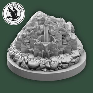 May include: A gray 3D printed miniature of a castle on a rocky base. The castle has a tall tower and a star-shaped courtyard. The base is surrounded by rocks.