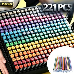 May include: A set of 221 markers arranged in a black carrying case, featuring a wide spectrum of coloured caps with numerical labels. The markers are organised in a grid pattern, and a circular inset shows a collection of thin, colourful marker pens.