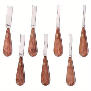May include: Set of seven wood carving tools with curved stainless steel blades. The handles are a dark brown color with a brass-colored accent. The blades are labeled with sizes, including 16mm, 14mm, 12mm, 10mm, and 6mm.