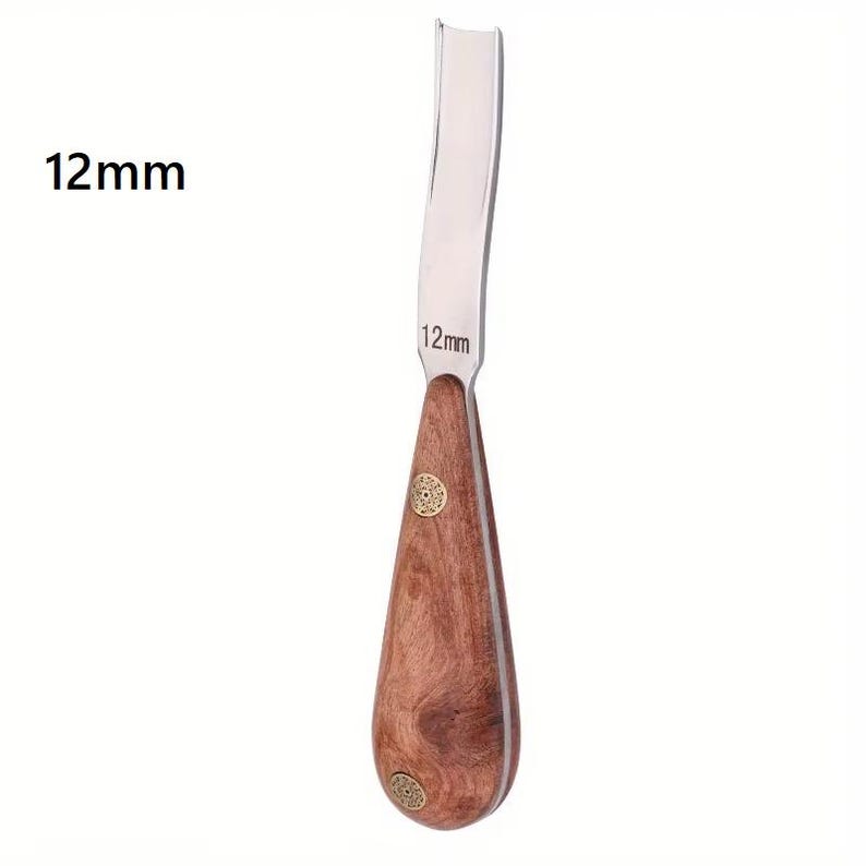 May include: A wood carving gouge featuring a curved metal blade with the text 12mm engraved on the steel. The tool has a teardrop-shaped wooden handle with two decorative circular brass rivets. The text 12mm is also displayed to the left.