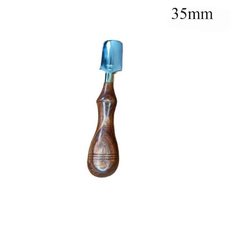 May include: A 35mm (1.38 inches) long, hand-held tool with a polished metal blade and a wooden handle. The handle is a dark brown color with a curved, ergonomic design. The blade is a shiny silver color.