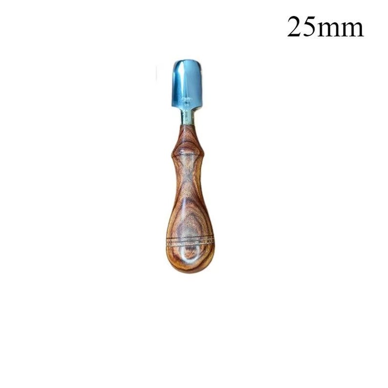 May include: A wood-handled tool with a silver-colored, curved blade. The handle is a dark brown with a wood grain pattern. The text "25mm" is in the upper right corner.